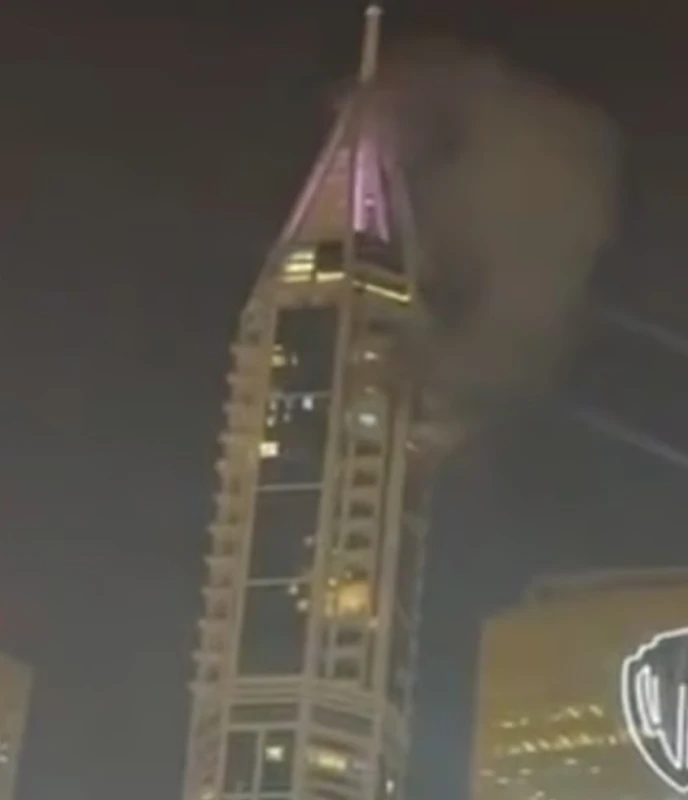 a-hole-in-the-dubai-marina-tower-due-to-a-drone-attack