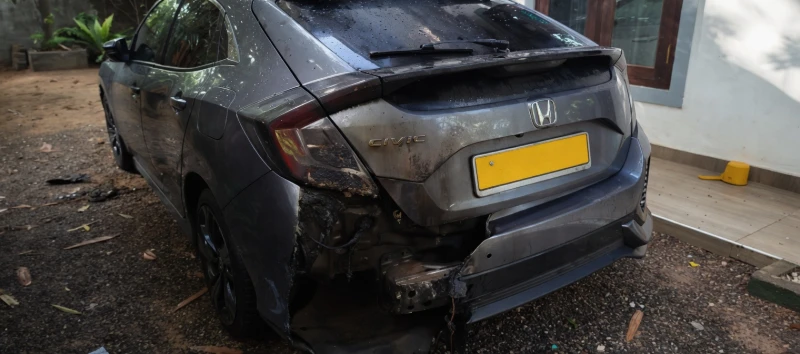 a-group-of-people-who-came-to-midigama-house-set-the-honda-civic-on-fire-and-fled
