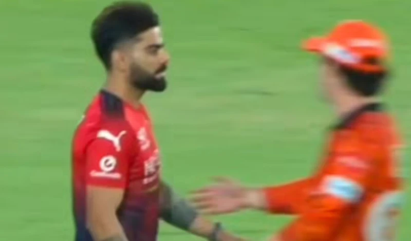 controversy-for-kohlis-refusal-to-shake-travis-heads-hand-after-the-wicket