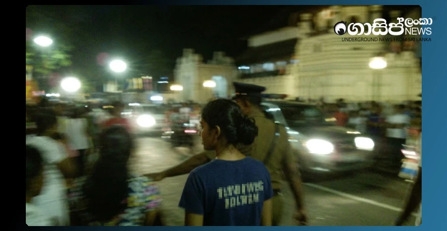 a-young-woman-came-to-watch-the-kandy-dalada-perahera-posing-as-a-female-police-officer