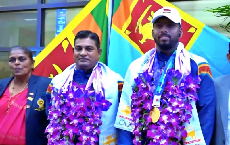 rumesh-returns-to-the-island-after-winning-the-gold-medal-in-japan-photos