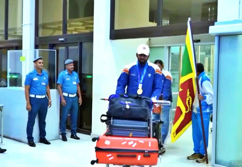 rumesh-returns-to-the-island-after-winning-the-gold-medal-in-japan-photos