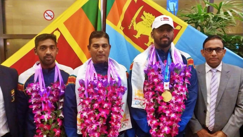 rumesh-returns-to-the-island-after-winning-the-gold-medal-in-japan-photos