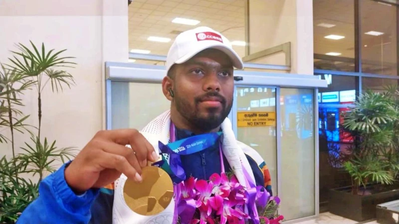 rumesh-returns-to-the-island-after-winning-the-gold-medal-in-japan-photos