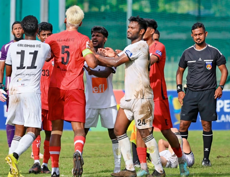 a-tense-situation-during-a-football-match-at-sugathadasa-stadium---police-protection-for-referees